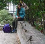 35Girl_feeding_birds_in_Rouen_Sept13