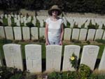 58Sue_at_Grave_site_of_Corporal_P_J_Moore_in_Terlincthun_British_Cemetery_Sept15